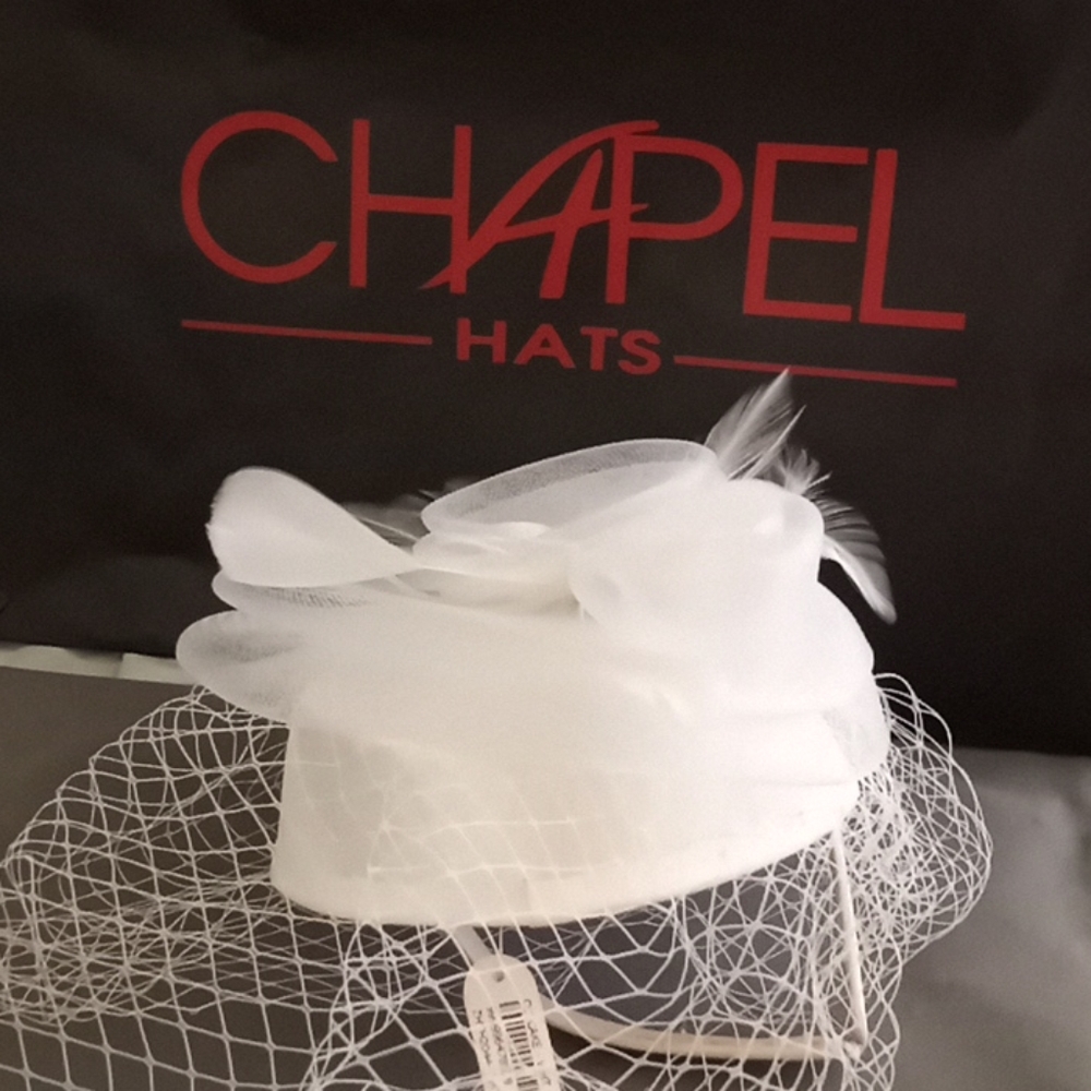 Fancy white hat from Chapel Hats